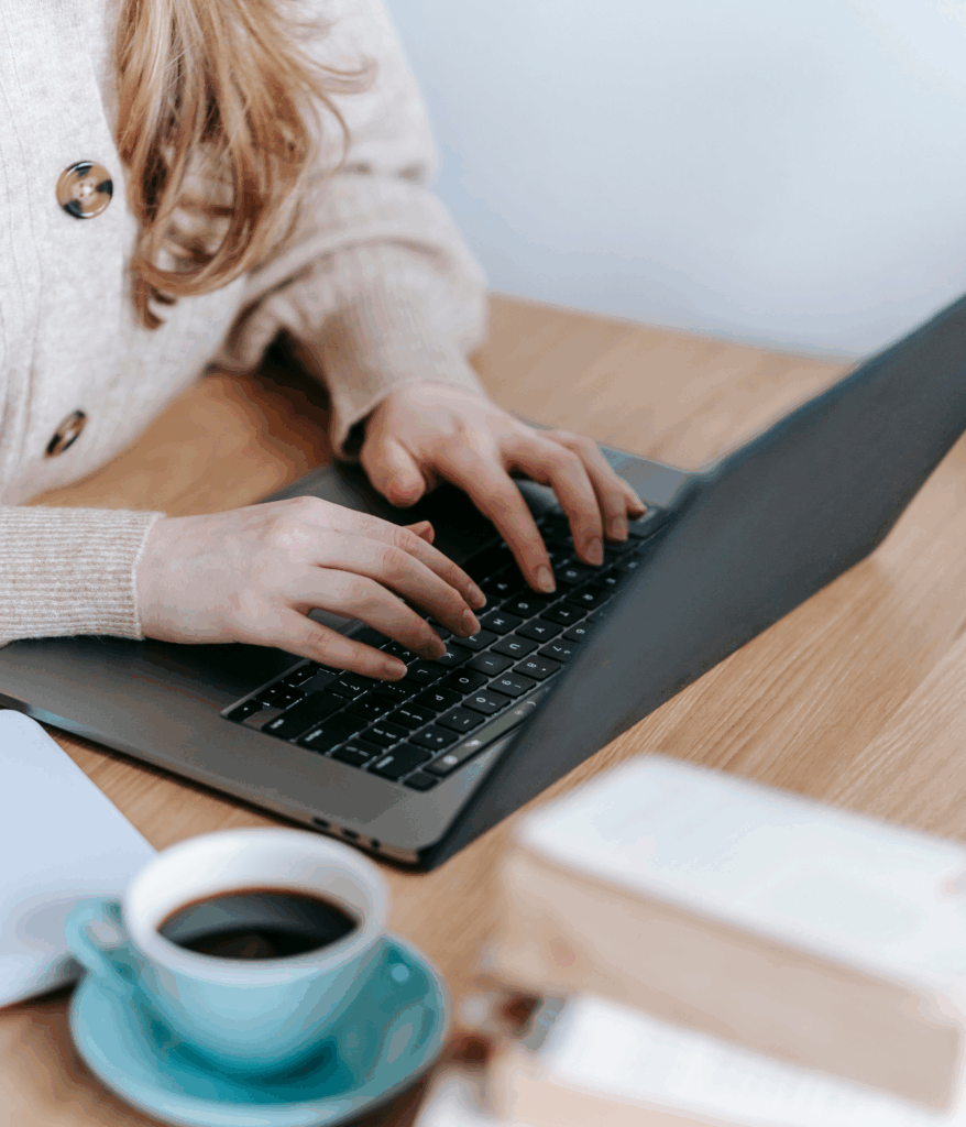 Person typing on laptop